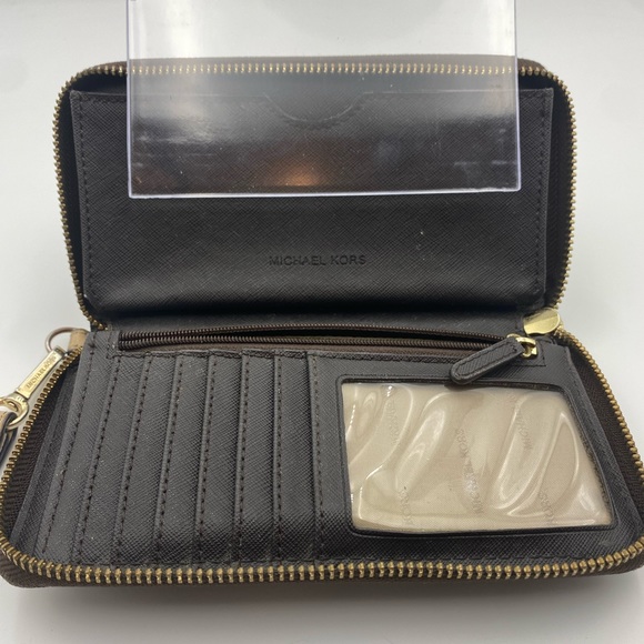 Michael Kors Zip Wallet in MK PrInt and wristlet. GUC - Picture 4 of 12